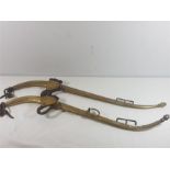 Pair of vintage brass horse haines
