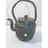 Lead tea pot with floral decoration set with 3 different stones approx. 7" tall