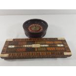 Small vintage roulette wheel plus cribbage board