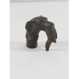 Cast bronze walking stick handle in form of dog with bard in mouth