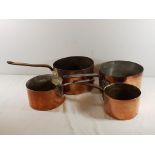 4 Antique copper saucepans, 2 are 10.5, 2 is 8'' and the smallest is 7'' diameters