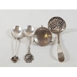 3 HM Silver spoons approx. 30.1gms together with a 1888 silver coin set onto 3 miniature animals