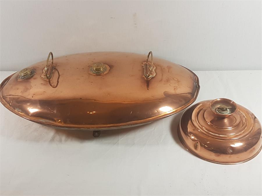 Large oval copper coach warmer 23'' x 15'', plus a circular copper warmer 9'' diameter