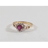 9ct Gold heart shaped ruby surrounded by diamonds with heart detail on the shoulders