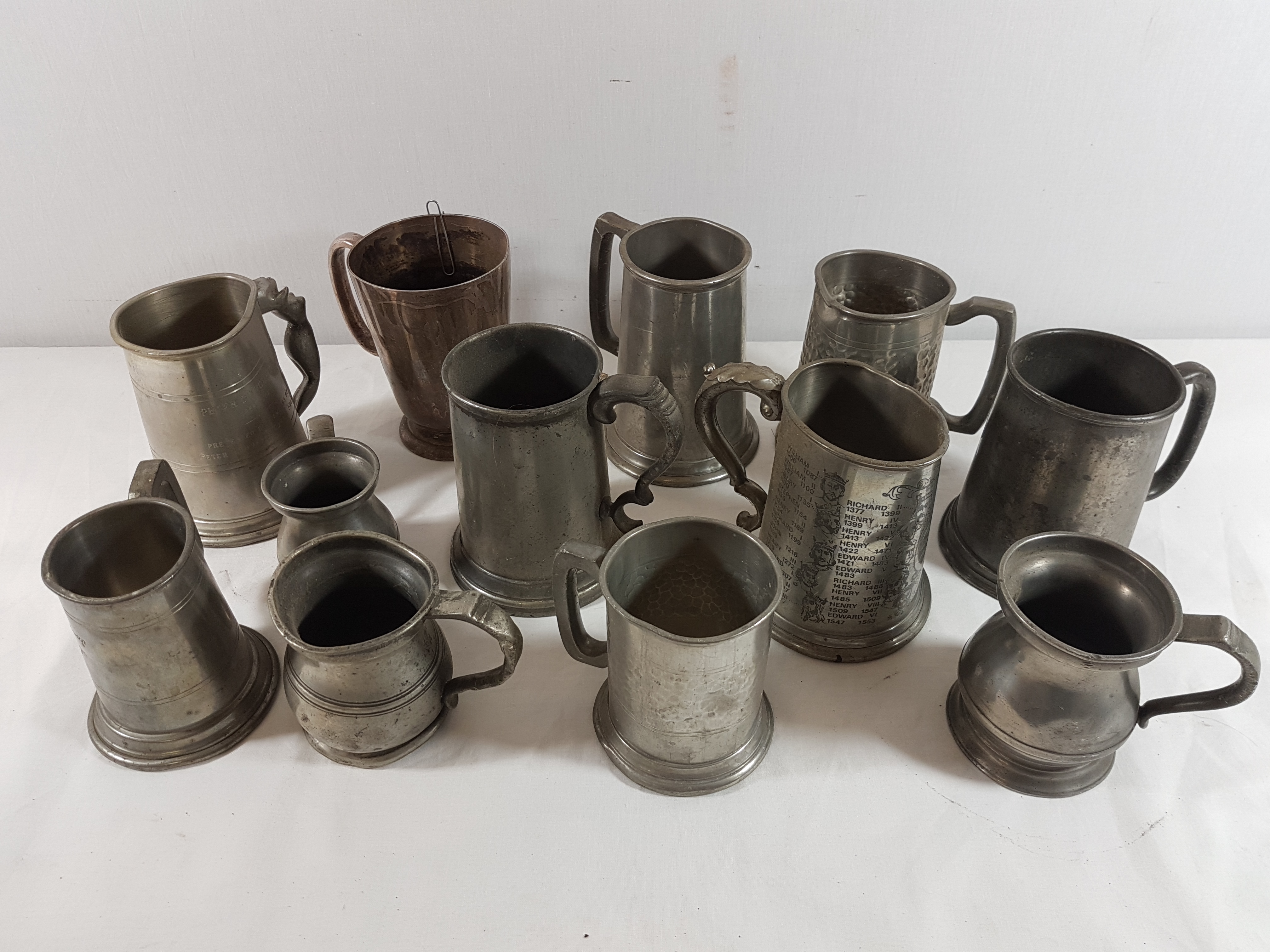 Collection of 14 antique pewter tankards