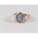9ct Gold opal ring set with smaller opals and dimaonds to the sholders