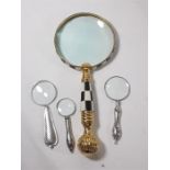 Large magnifying glass with 3 smaller examples