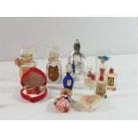 11 Various perfume bottles to include Nina Ricci