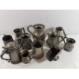 Collection of 12 antique pewter tankards and a sugar scuttle