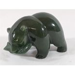 Carved jade Figure of a bear holding a fish in its mouth