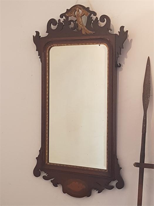 Antiqur mahogany framed wall mirror with gilt eagle decoration to top