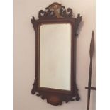 Antiqur mahogany framed wall mirror with gilt eagle decoration to top
