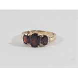 9ct Gold ring set with 3 garnets and diamond set sholders