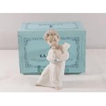 Lladro figure of a cherub playing a pipe complete with box