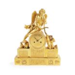 An unusual early 19th century French Empire gilt bronze figural mantel clock