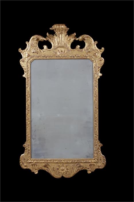 A George III carved giltwood and gesso mirror