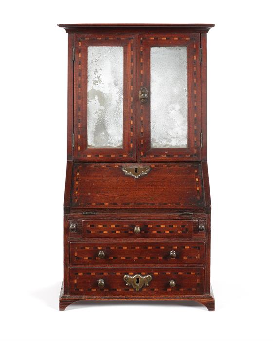 Miniature Furniture: A George II mahogany and chequerbanded bureau bookcase