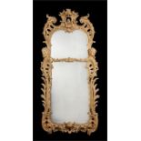 A large and impressive George II style carved giltwood pier mirror