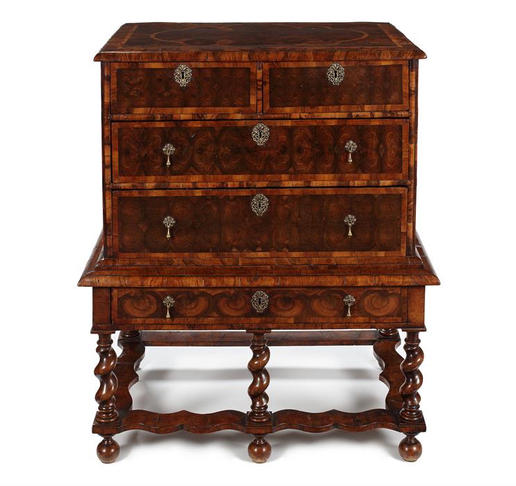 A William and Mary olive oyster veneered, walnut and ash banded chest on stand