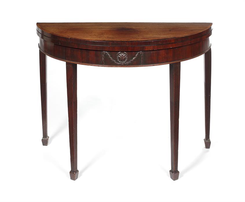 A George III mahogany and rosewood demi-lune card table