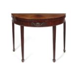 A George III mahogany and rosewood demi-lune card table