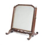 A George II carved mahogany cheval dressing mirror