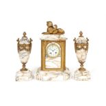 A late 19th century French Louis XVI style pink brignoles marble clock garniture