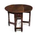 A small William and Mary oak gate-leg table
