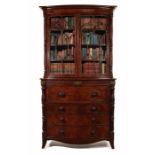 A William IV Scottish carved mahogany and brass inlaid bowfront secretaire bookcase