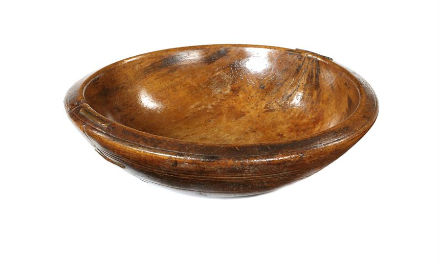 A late George III beech dairy bowl