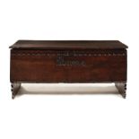 A Charles II oak plank chest
