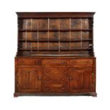 An early George III figured elm dresser, North Wales