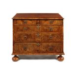 A William and Mary walnut and burr walnut crossbanded chest