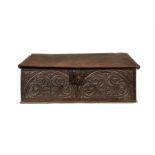 A Charles II oak carved box