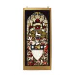 An early 19th century polychrome stained glass armorial panel in a later framed light box
