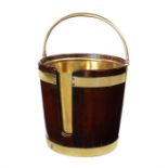 A late George III mahogany and brass bound plate bucket