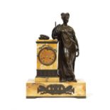 A large mid 19th century siena marble and patinated bronze figural clock by E.Courtin