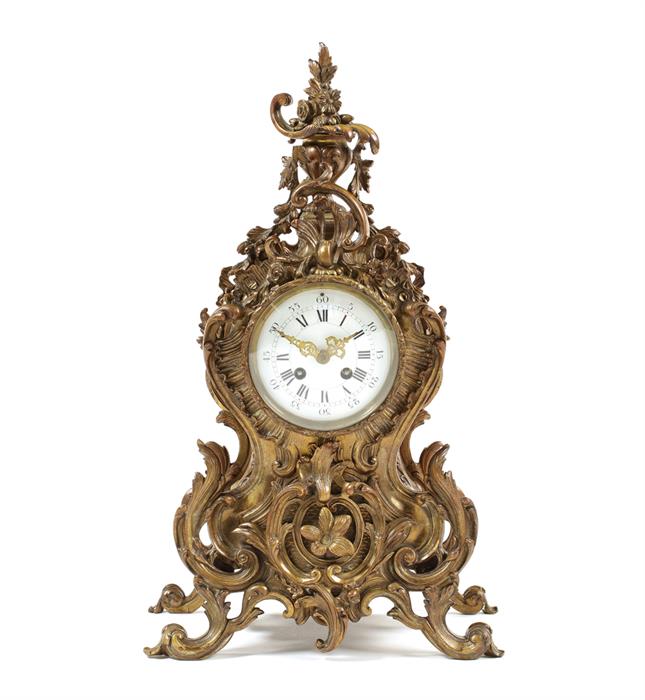 A late 19th century Louis XV style gilt metal mantel clock