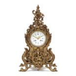 A late 19th century Louis XV style gilt metal mantel clock