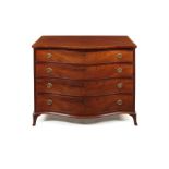 A George III mahogany and banded serpentine dressing commode attributed to Gillows