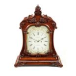 A Victorian carved mahogany bracket clock signed for Roskell, Liverpool
