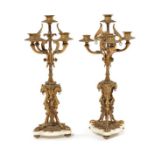 A pair of late 19th century French gilt bronze and white marble five-light candelabra