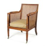 A Regency mahogany bergere