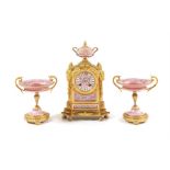 A late 19th century Pompadour pink clock garniture by Japy Freres