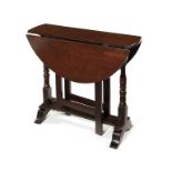 A small William and Mary oak gate-leg table