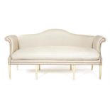 A George III style white painted hump back sofa