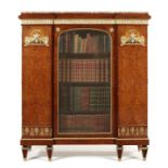 A late 19th century Empire style birds-eye maple and gilt-bronze mounted bibliotheque