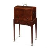 A Regency figured mahogany and rosewood crossbanded dome-top deed box on stand