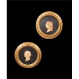 A pair of early 19th century Grand Tour profile portrait medallions