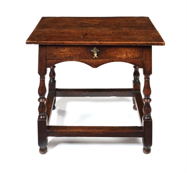 A George II walnut single-drawer side table